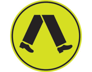 Pedestrian crossing sign - walking pictogram symbol inside yellow circle - road sign